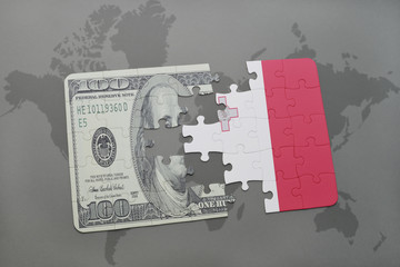 puzzle with the national flag of malta and dollar banknote on a world map background.
