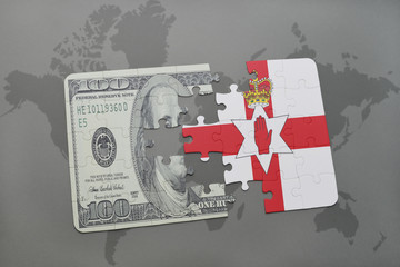 puzzle with the national flag of northern ireland and dollar banknote on a world map background.