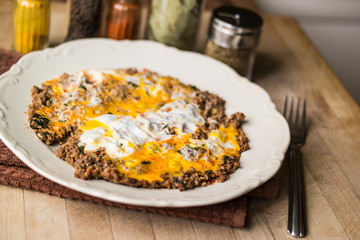 Fried egg with minced meat.