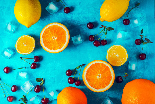 Different  fruit on the cyan background top view