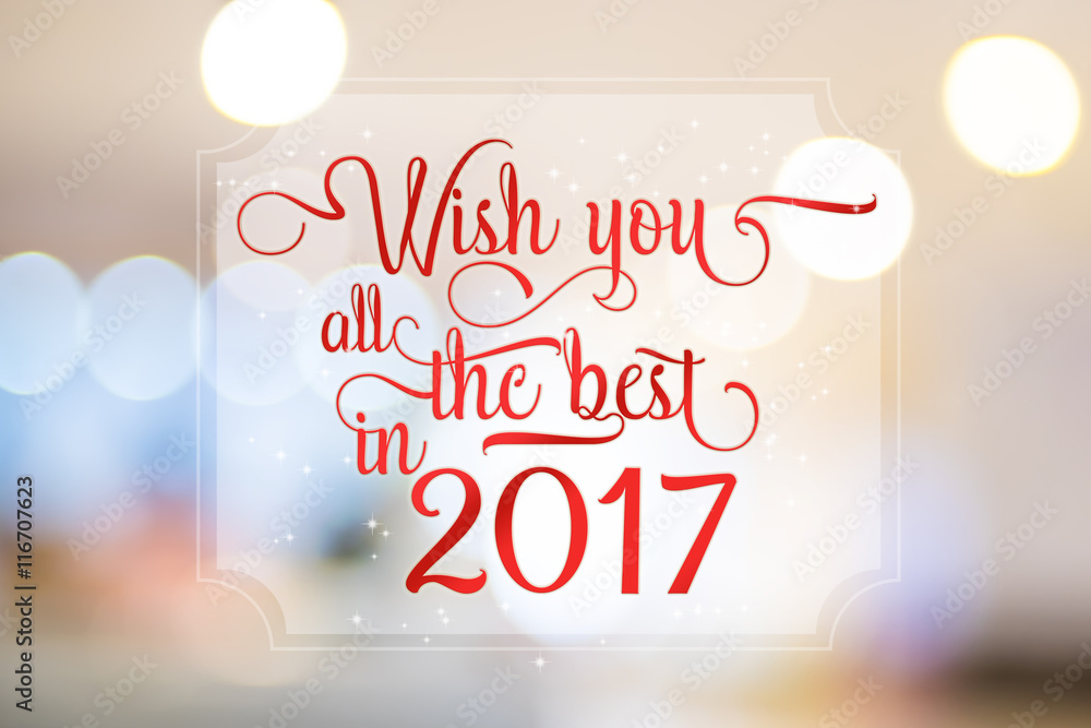 Poster wish you all the best in 2017 word on white frame at abstract blurred bokeh light background, holida
