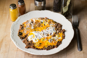 Fried egg with minced meat.