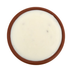 Fat-free blue cheese dressing in a small bowl on a white background