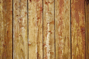 Old boards, badly painted, brown, old, the paint remains