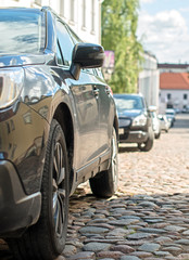 Cars parked along the street.