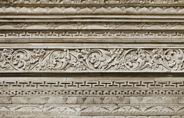 Stone ornament on wall of old temple. Indonesia, Bali Island
