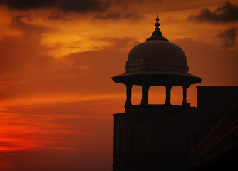 Silhouette of tower on sunset sky background, Red ford, Agra, In