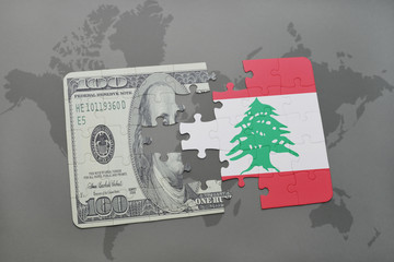 puzzle with the national flag of lebanon and dollar banknote on a world map background.