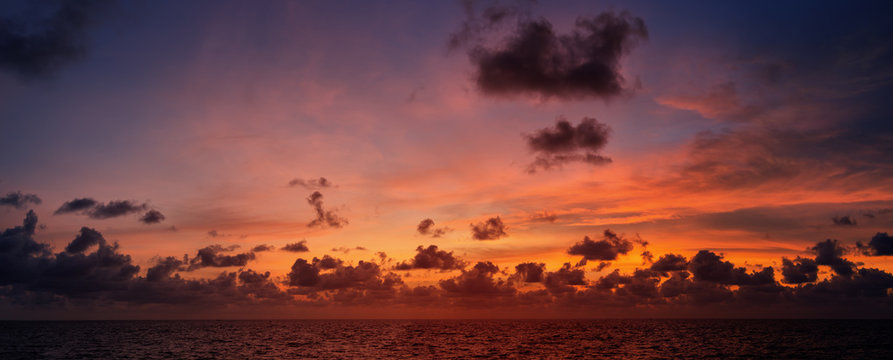 Picturesque beautiful view of sky at sunset over tropical ocean