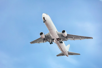 Fototapeta na wymiar Passenger airplane on the sky background