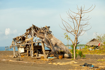 Ruined hut on the beach. Indonesia, Bali