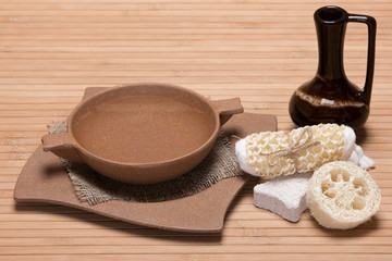 Spa and peeling accessories on wooden surface