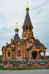 Fototapeta na wymiar The Orthodox Church in the village of Srostki