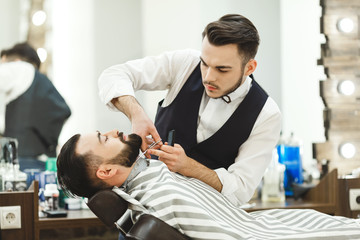 Barber making a beard