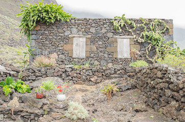 Fototapeta na wymiar Exterior of old stone house in a medieval village, Frontera, El Hierro