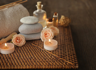 Beautiful spa composition with flowers on wooden background