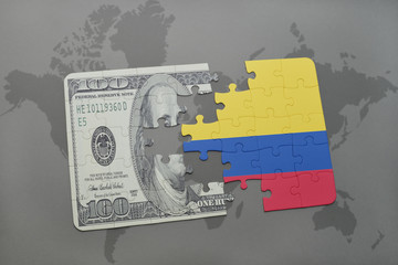 puzzle with the national flag of colombia and dollar banknote on a world map background.