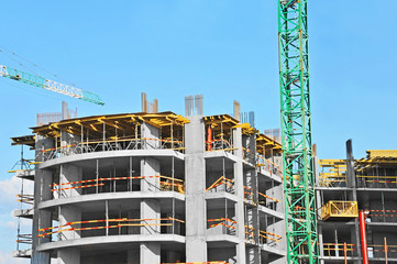 Crane and highrise construction site