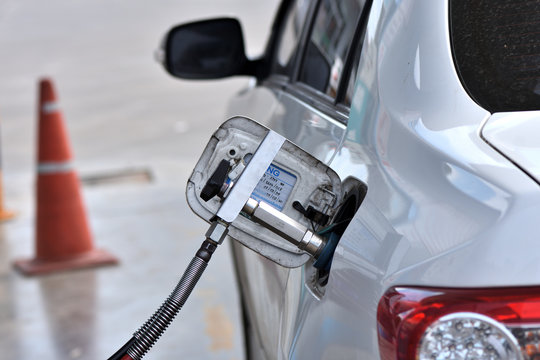 Filling CNG Fuel Tank At A Gas Station.