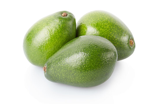 Avocado fruits group isolated on white, clipping path
