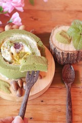 Green tea cake roll and matcha green tea.