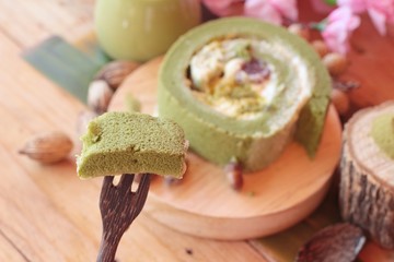 Green tea cake roll and matcha green tea.