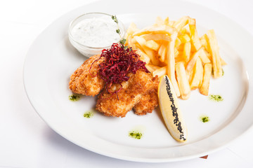 dish of meat in batter and fried potatoes