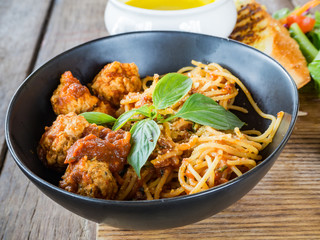 Spaghetti pasta with meatballs and tomato sauce