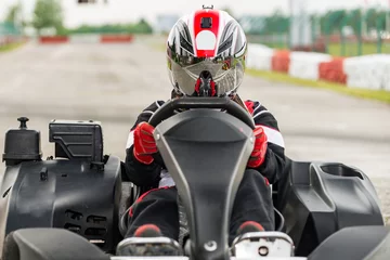 Photo sur Plexiglas Sport automobile Go kart racer on the track