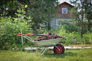 Cart with ground in the garden