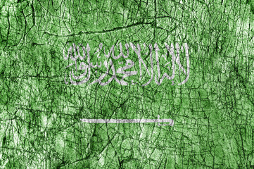 Grudge stone painted Saudi Arabia flag and written arab word 