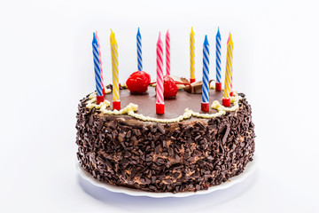 cake chocolate and candles isolated on white background