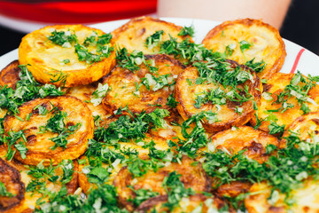 fried zucchini on a plate blurred background
