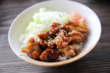 Grilled Chicken teriyaki rice on wood background , japanese food