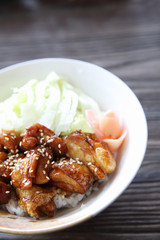 Grilled Chicken teriyaki rice on wood background , japanese food