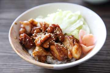 Grilled Chicken teriyaki rice on wood background , japanese food