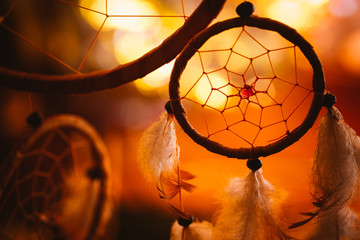 black and white photo of a dream catcher at sunset purple dark background
