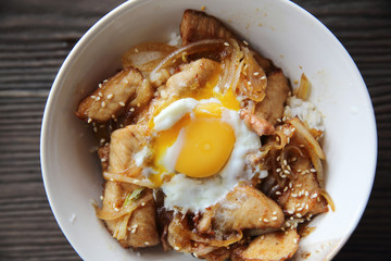 rice with slice pork and egg butadon - japanese food