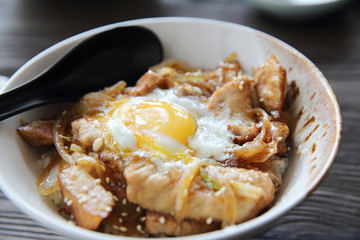 rice with slice pork and egg butadon - japanese food