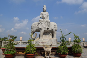 statue of buddha riding elephant in Chau Thoi temple in Binh Duong province, Vietnam