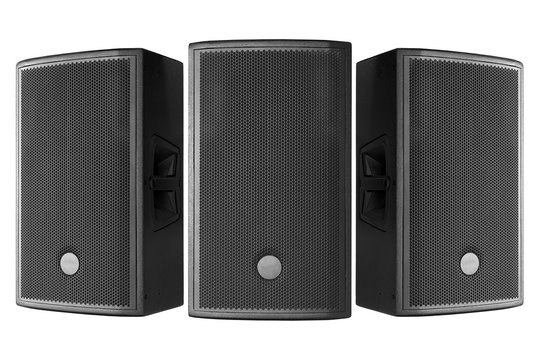 Three loudspeakers on a white background