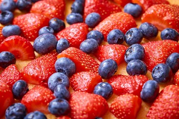 Closeup of strawberry and huckleberry cake