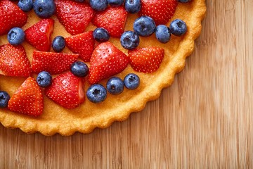 Top view of strawberry and blueberry dessert
