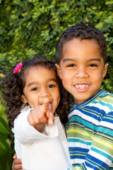 Hispanic brother and sister.