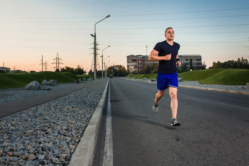 Full length portrait of athletic man running