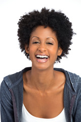 Happy African American woman laughing.