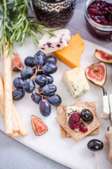 serving cheese board with wide selection