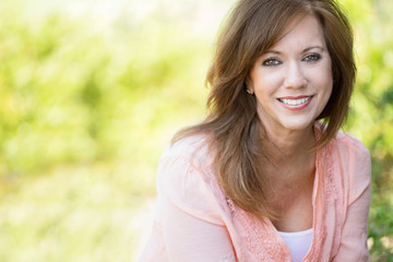 Woman smiling at the park