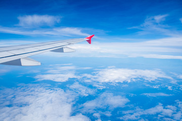Fototapeta premium View airplane cloudy in blue sky