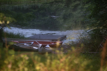 Canoes on a Pond